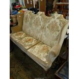 A most elegant high back three seater Sofa/Settee standing on unusual shaped hardwood front legs