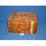 A Walnut correspondence box with brass banding and escutcheon,