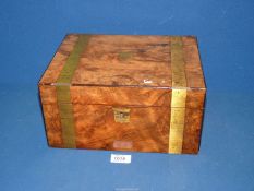 A Walnut correspondence box with brass banding and escutcheon,