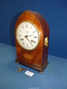 A Comitti of London mantle Clock with two brass lion handles to sides,