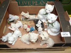 A quantity of figures to include West Highland terriers,