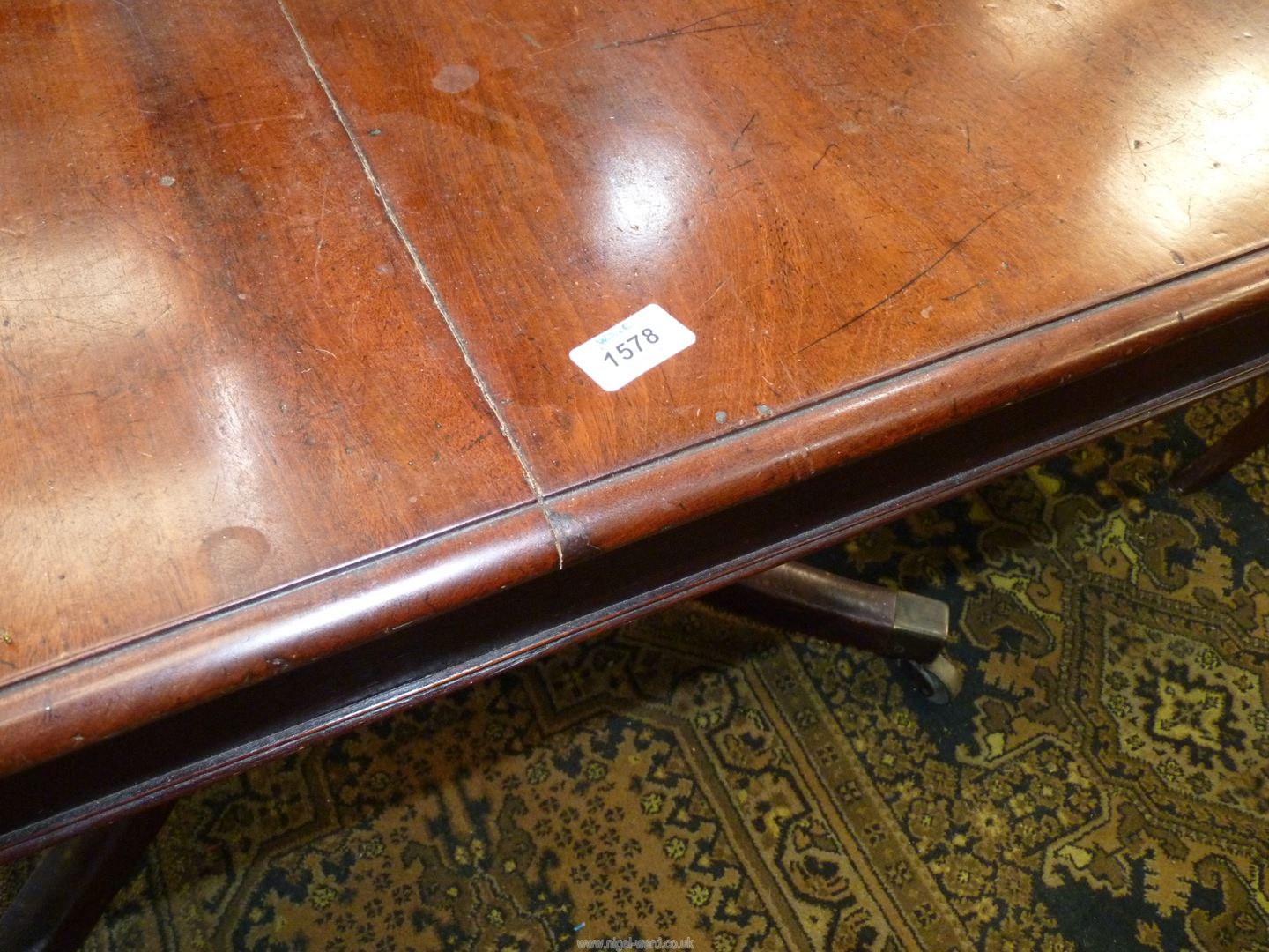 A 19th century Mahogany rectangular Dining/Centre Table having narrow drop leaves and raised on a - Image 3 of 3