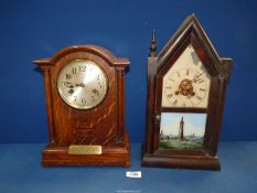 Two wooden cased mantle Clocks; one having Roman numerals, a presentation plaque, key & pendulum,