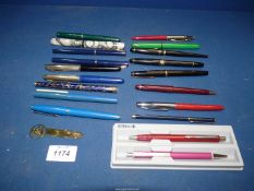 A quantity of fountain pens and pens including Champion, Conway Stewart etc.