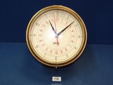 A Gents of Leicester brass porthole Clock converted to battery,