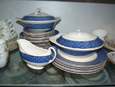 A Ridgway 'Conway' blue spot dinner set, including six dinner plates, two lidded tureens,