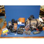 A quantity of cameras and binoculars including Haco 8 x 30 Field binoculars, Canon EOS 1000F camera,