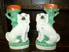 A pair of Staffordshire mantle Spaniel spill vases, 11" tall.