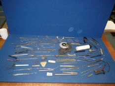 A quantity of vintage medical instruments/equipment, tweezers, etc., possibly dentistry, etc.