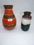 A vintage German baluster vase with raised bands of red and brown decoration, 10" tall,