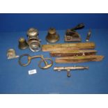 A quantity of miscellanea including a horse bit, two bells '7' and 'B', safe lock,