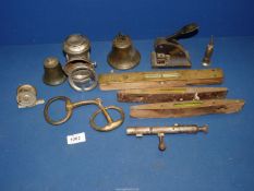 A quantity of miscellanea including a horse bit, two bells '7' and 'B', safe lock,