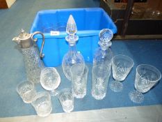 A quantity of glass including claret jug, two decanters, whisky and brandy glasses,