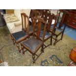 A set of six 1940/50's dark Oak framed Dining Chairs having turned front legs and with Rexene