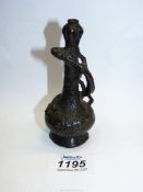An antique Chinese bottle vase with entwined dragon, dark age patina in semi excavated condition,