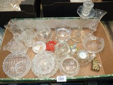 A quantity of glass to include cut glass rose bowl, paperweights, vases, candlestick etc.