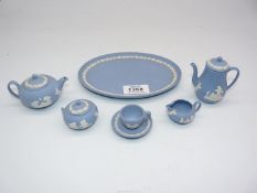 A Wedgwood Jasperware miniature tea set for one, includes teapot, water/coffee pot,