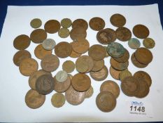 A quantity of coins including; George VI, Elizabeth II, threepences, George V, etc.
