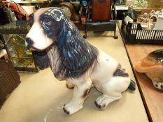 A large china Fireside cocker spaniel, hairline crack to ear, 16" tall.