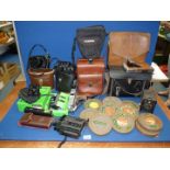 A quantity of camera/film bags, a boxed Fujica Single 8 Splicer, old cine film reels,