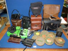 A quantity of camera/film bags, a boxed Fujica Single 8 Splicer, old cine film reels,