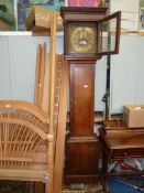 An imposing Oak Long-case Clock having a brass face with cast brass spandrels,