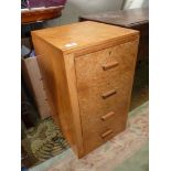 A Maple type wood-finished flight of four short Drawers,