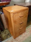A Maple type wood-finished flight of four short Drawers,