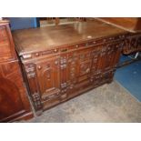 An appealing Oak blanket Chest/Coffer, the front with arts and crafts style applied details,