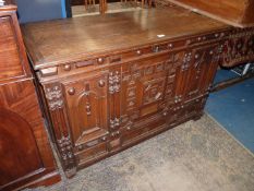 An appealing Oak blanket Chest/Coffer, the front with arts and crafts style applied details,