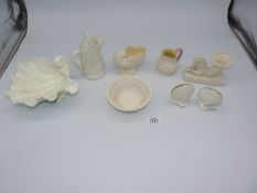 A quantity of white china to include; Belleek hippocampus vase, Belleek shell vase,