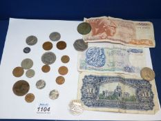 Two Greek bank notes, Yugoslavia bank note and a small quantity of foreign coins.