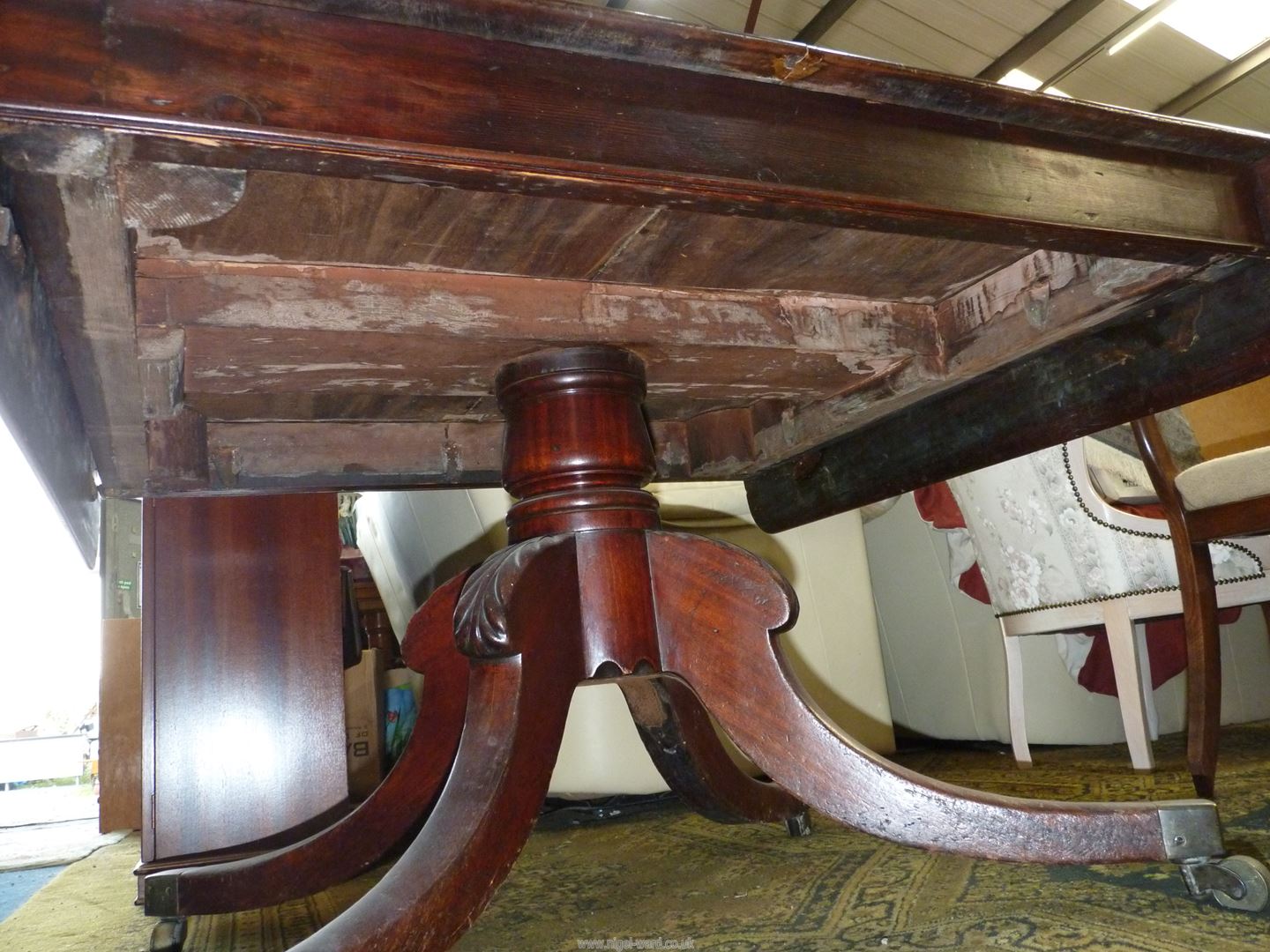 A 19th century Mahogany rectangular Dining/Centre Table having narrow drop leaves and raised on a - Image 2 of 3