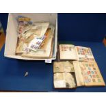 A quantity of mostly loose foreign stamps plus a partly filled Lincoln stamp album, etc.