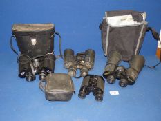 Four pairs of binoculars including Komms Giant - 60 20x60, Sunagor 10x - 40x50,