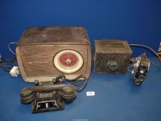 A film projector, a Quartz M film recorder, Reliance telephone and a Bush radio (a/f).