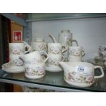 A Meakin 'Damask Rose' tea set for six (no bread and butter plate but with coffee pot and extra