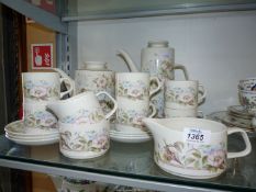 A Meakin 'Damask Rose' tea set for six (no bread and butter plate but with coffee pot and extra