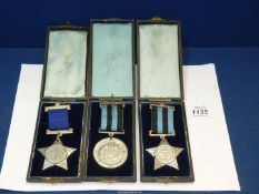 Three 'Regular Attendance' medals.
