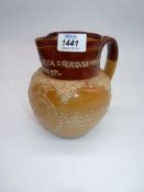 A Doulton Lambeth stoneware jug to commemorate Queen Victoria Diamond Jubilee 1897.