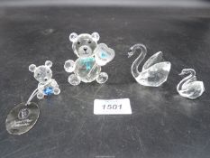 A small quantity of crystal animal - bears and swans.