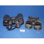 Two pairs of Binoculars; one leather Military pair by L. Petit Fabt Paris marked 5.