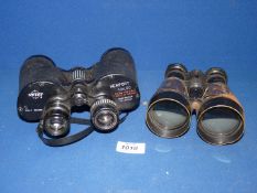 Two pairs of Binoculars; one leather Military pair by L. Petit Fabt Paris marked 5.