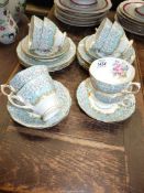 A Royal Albert 'Enchantment' part tea set including eight tea cups and saucers and nine tea plates.