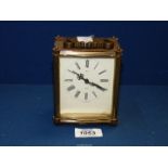 A 1950's Smiths eight day brass Carriage Clock, 5" tall x 3½" wide.