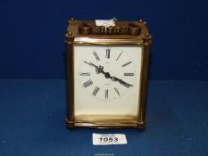 A 1950's Smiths eight day brass Carriage Clock, 5" tall x 3½" wide.