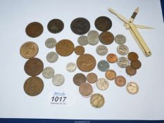 A small quantity of coins including sixpences, silver threepence, Georgian penny,