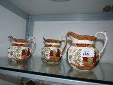 A set of three Wedgwood 'Willow' graduated jugs.