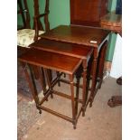 A nest of three spindle turned legged Mahogany occasional Table,