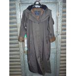 A Jack Murphy ladies raincoat, size 12.